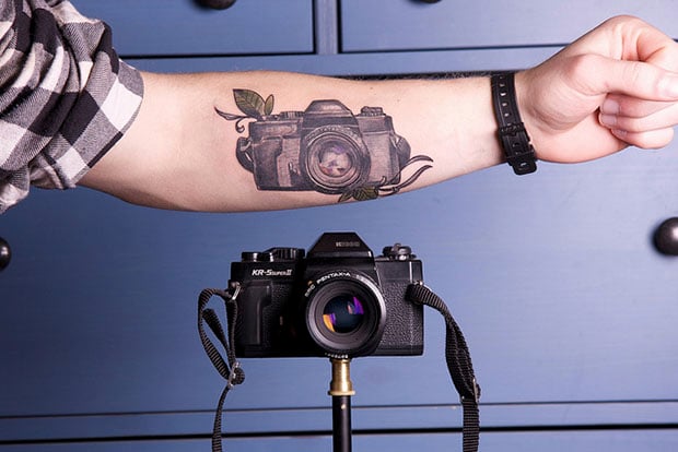  off their love for the art by having a camera tattooed to their body.