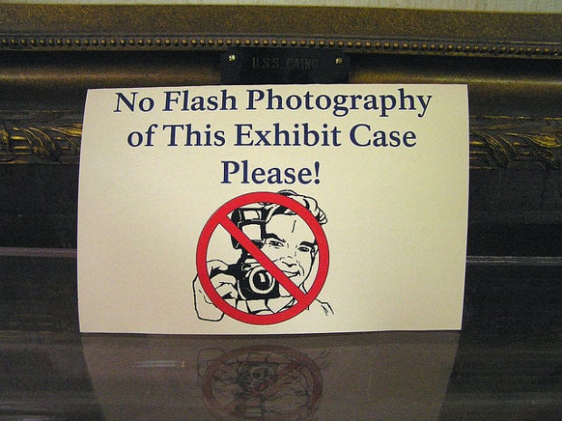 The Reasons and Myths Behind the No Flash Photography Sign 