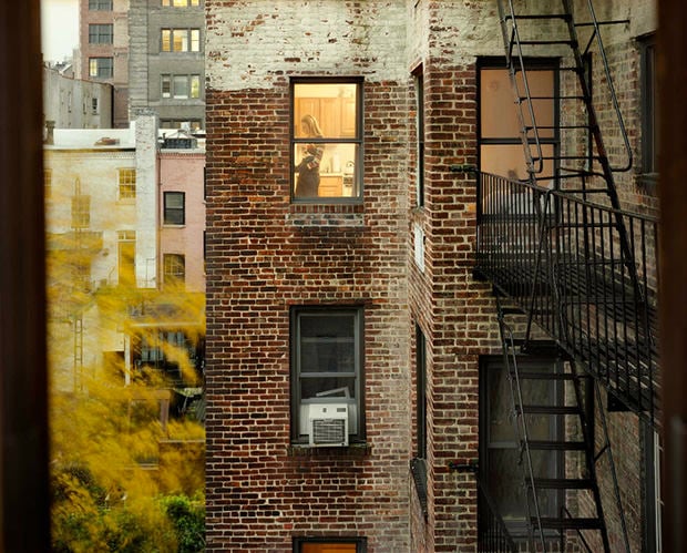 Voyeuristic Portraits of New Yorkers Seen Through Apartment Windows window5 mini