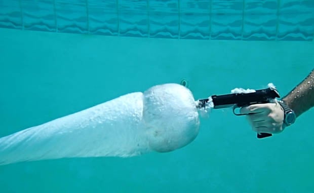 OLYMPUS DIGITAL CAMERA Amazing Photos That Show What It Looks Like to Fire a Gun Underwater gununderwater