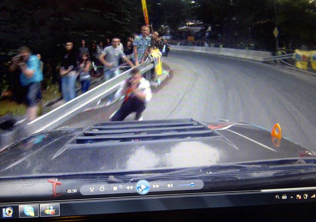 Man Nearly Earns a Darwin Award Trying to Capture the Perfect Racing Photo screenshot