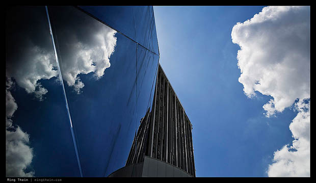 (Nearly) symmetric, but visually balanced. The two are not the same thing.