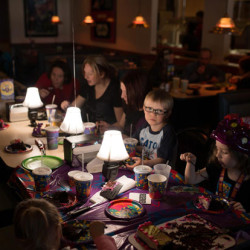 Using Incognito Flash Lamps to Illuminate Partygoers at a Table