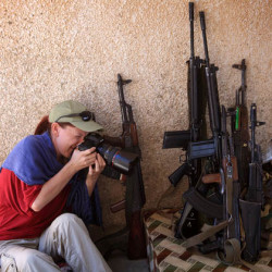 Conflict Photog Leans on